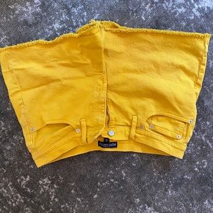 Yellow cutoff shorts